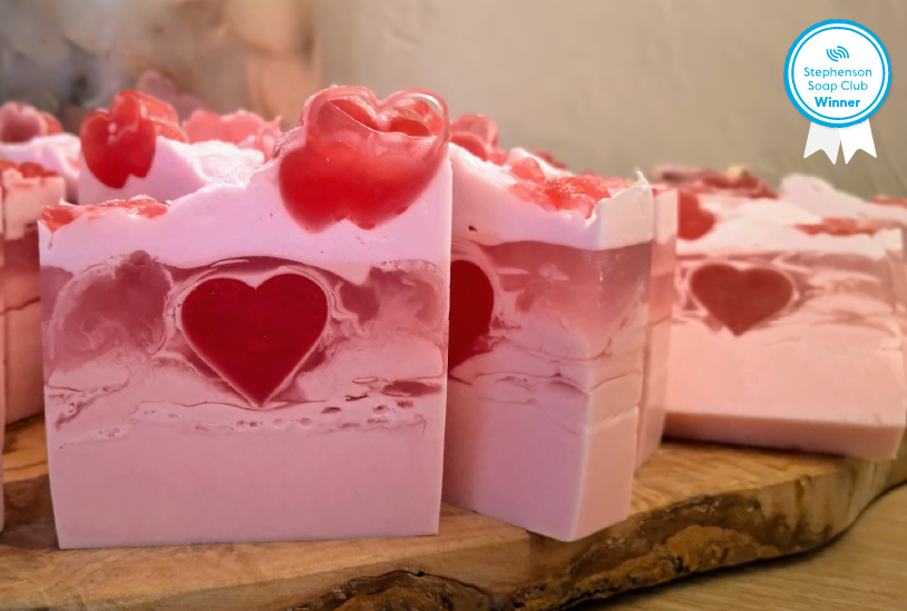 A beautiful layered soap loaf with love heart embeds.